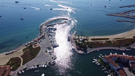 Boats-sailing,-speeding,-ocean-water-motion,-beautiful-marina-scenery