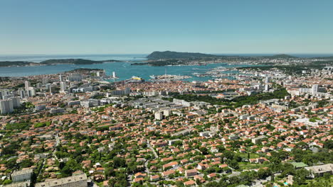 Aerial-Pullback-Toulon-City-at-the-Mediterranean-Sea,-Sunny-Summer-Day