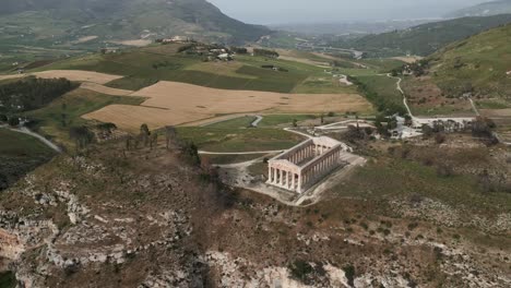 Aerial-of-Archaeological-Park-of-Segesta-ruins-in-Sicily-,-Italy