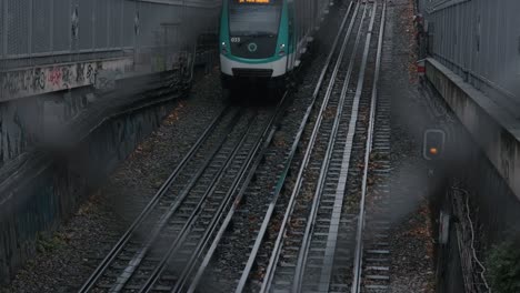 Close-up-of-subway-train-entering-station-in-Paris