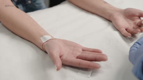 Close-up-of-a-woman's-arm-with-a-patch,-preparing-for-laser-hair-removal-treatment