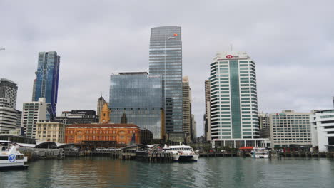 Auckland,-New-Zealand-leaving-the-Ferry-Terminal-on-Queen-Street