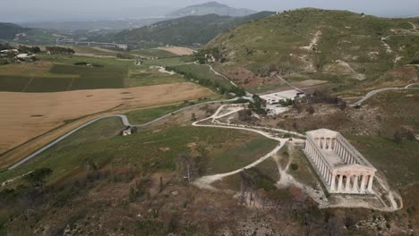 Aerial-of-Archaeological-Park-of-Segesta-ruins-in-Sicily-,-Italy