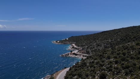 Highway-passing-by-the-sea,-drone-view,-sea-view