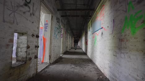 Scared-feelings,-serial-killer,-silhouetted-figure,-long-dark-hallway