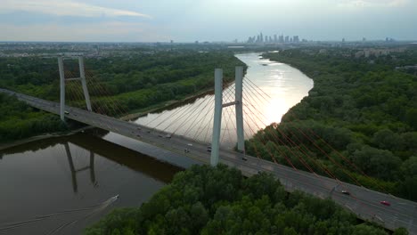 Aerial-View-Over-Siekierkowski-Bridge-And-River-Vistula-In-Warsaw,-Poland---Drone-Shot