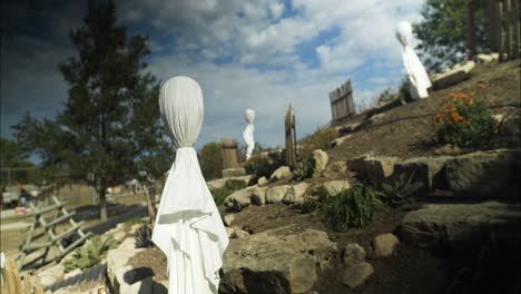 White-ghost-decorations-at-halloween-pumpkin-patch