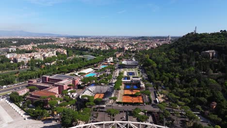 Backward-Drone-Shot-Reveals-Rome's-Olympic-Stadium-on-Beautiful-Summer-Day
