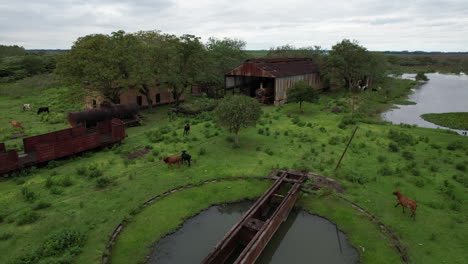 Old-abandoned-train-station-in-San-Salvador,-Paraguay,-Aerial-Shot