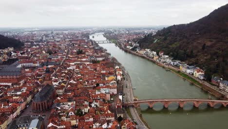 Panoramic-Drone-View-of-Heidelberg-City-Landmarks-on-Neckar-River,-Germany