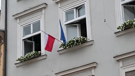 Flying-Polish-and-European-flags-in-Krakow