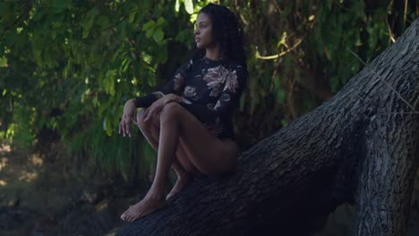 A-young-woman-in-a-bikini-is-enjoying-a-sunny-day-on-a-tropical-beach-in-Trinidad