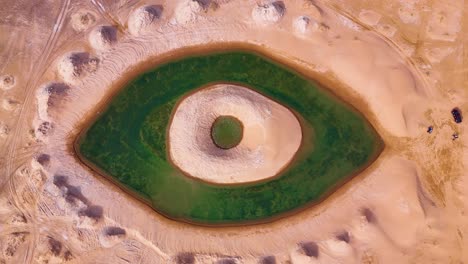 Aerial-view-of-the-Artificial-Eye-Lake-in-the-Tengger-Desert,-Inner-Mongolia-Autonomous-Region,-China