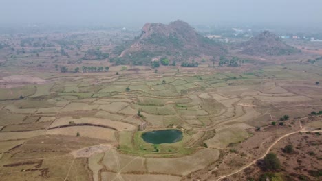 Drone-video-shot-of-vast-area-after-harvesting-in-plateau-region