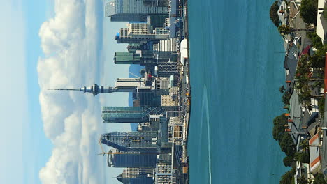 Auckland-city-skyline-and-sky-tower-in-New-Zealand---vertical-pullback-reveal