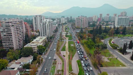 Aerial-flyover-of-the-Americo-Vespucio-Oriente-Park,-fall-in-Las-Condes,-Chile