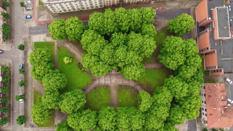 Aerial-Top-Down-View-of-Green-Square-and-Surrounding-Buildings-in-Klaipeda,-Lithuania