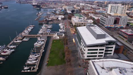 Port-of-Oakland,-California-USA,-Aerial-View-of-Inner-Harbor-Marina-and-Waterfront-Buildings,-Drone-Shot