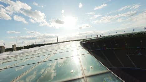 UEFA-EURO2024-FPV-Drone-flying-over-roof-Olympic-Stadium-Berlin-sunny-day