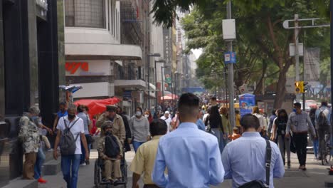 Crowd-of-people-on-the-streets-of-Mexico-City-during-the-day,-Latin-America