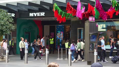 People-queues-up-in-front-of-Myer-Bourke-Street-Mall-to-see-the-Bluey's-Christmas-display-in-the-department-store's-windows-in-Melbourne-central-business-district