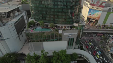 Aerial-view-of-Terminal-21,-a-large-mixed-use-complex-at-the-major-junction-of-Sukhumvit-and-Asoke-Road-in-Bangkok's-business-district