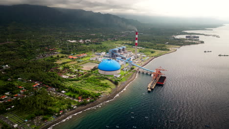 Drone-dolly-view-over-industrial-Celukan-Bawang-power-plant-on-Bali-coastline