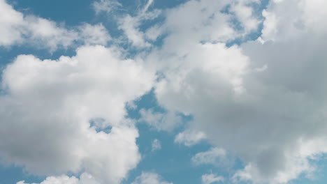 Handheld-footage-of-clear-blue-sky-with-clouds