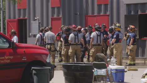 Hazardous-Materials-Response-Team-trailer-and-fire-fighters-in-Siloam-Springs,-Arkansas-on-a-sunny-day