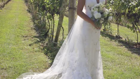 Bride-glistens-and-smiles-in-the-sun-beautifully