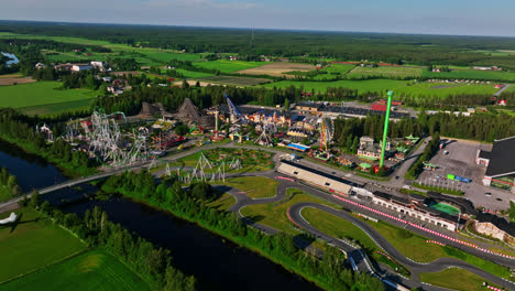 AERIAL:-Powerpark-theme-park-and-the-Mika-Salo-circuit,-summer-day-in-Finland