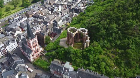 Werner-Chapel-and-Bacharach-Town-Church-By-Rhine-River-Valley,-Drone-View