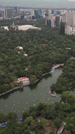 Aerial-view-of-Chapultepec-Park-and-its-lakes,-Mexico-City,-vertical-mode