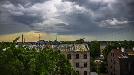 Dark-Stormy-Clouds-Above-Historic-Town-With-Rustic-Buildings