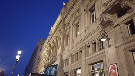 Street-View-of-Teatro-Colon-Theater-Night-Argentine-blue-dusk-obelisk-skyline-in-9-de-Julio-Avenue