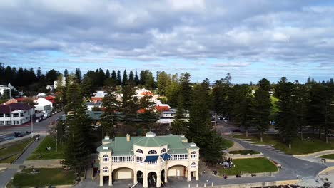 Wide-Aerial-descending-over-Cottesloe-Beach-and-Indiana-Tea-House-Perth,-WA