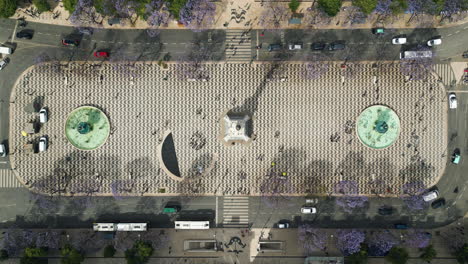 Top-down-drone-shot-above-the-Praca-Dom-Pedro-IV-square,-in-Lisbon,-Portugal