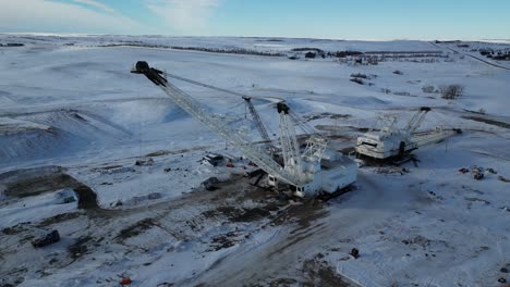 4K-Drone-video-of-snowy-white-mining-crane-in-North-Dakota-with