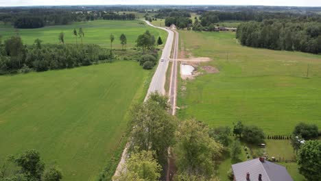 An-aerial-view-of-Livi-city,-highlighting-its-green-spaces-and-extensive-cycle-paths-next-to-the-main-road