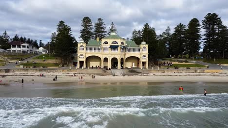 Aerial-view-wide---Cottesloe-Beach-and-Indiana-Tea-House,-Perth,-WA