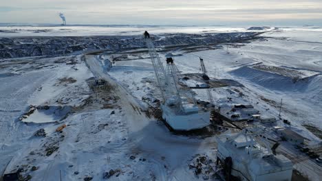 4K-Drone-video-of-snowy-white-mining-crane-in-North-Dakota-with