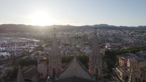 Fly-Over-Cathedral-And-City-Of-Palma-In-Mallorca-At-Sunrise