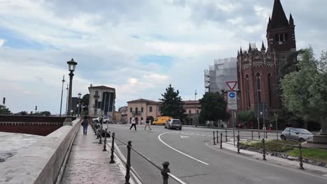 Church-San-Fermo-Maggiore-road-and-red-bricked-arched-bridge-in-Verona,-Italy