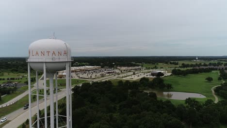 This-is-an-aerial-video-of-the-Lantana-Water-Tower-and-shop-area