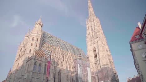 Tilt-up-shot-of-Saint-Stephen's-Cathedral-illuminated-by-sunlight