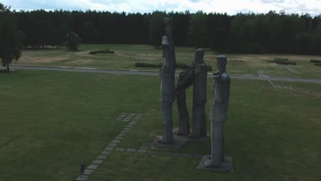 An-aerial-shot-around-a-group-of-enormous-statues