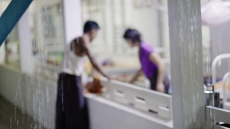 burmese-parents-preparing-for-night-with-heavy-rain-in-front