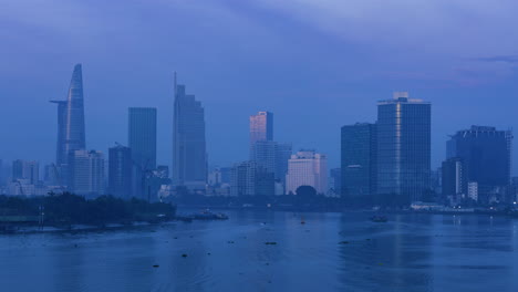 4k-Time-Lapse-View-of-Financial-Center-and-City-Skyline-from-a-Bridge-over-the-Saigon-River