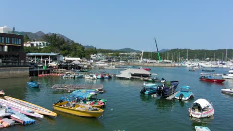 Hebe-Haven-of-Sai-Kung-peninsula-Hong-Kong-marina-with-small-boats,-Aerial-view