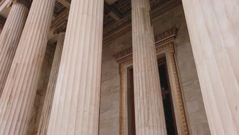 Slow-moving-shot,-scenic-view-of-exterior-design-of-Athens,-Greece,-Temple-column